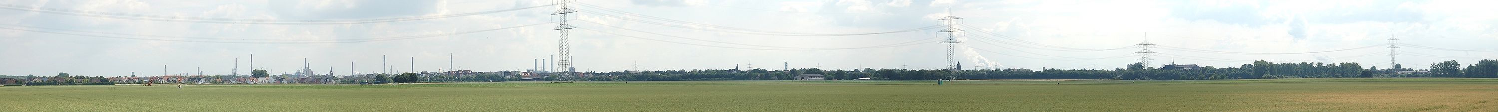 Panorama der Stadt Dormagen - links der Ort Rheinfeld und die Chemieunternehme bis rechts zum Raphaelshaus