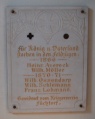 Füchtorf-St.Mariä-Himmelfahrt linke Gedenktafel.jpg